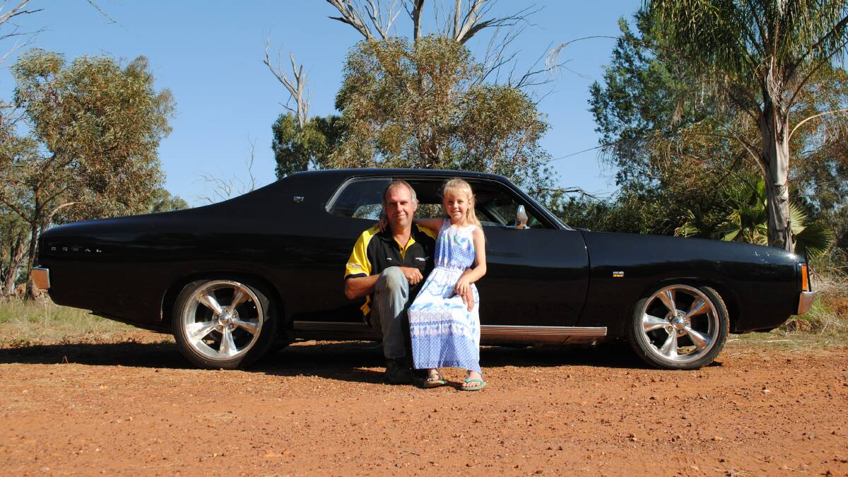 Valiant: Greg Morrison and his daughter Matilda. Greg’s car is build number 48 of 1280 VJ hardtops produced by Chrysler in Australia and what makes it rare is that it is one of only five factory built.