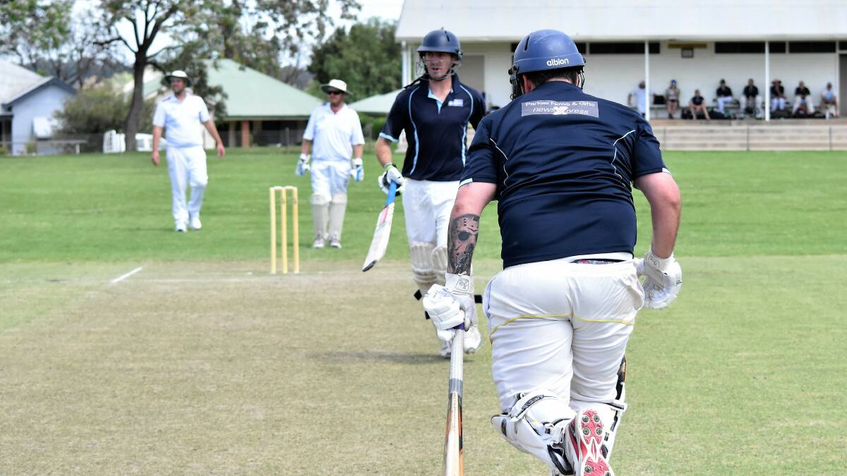 Fast and Furious: Myles Smith and Aaron Halls run between the wickets. Myles hit three towering sixes off three consecutive balls at one stage of his innings.
