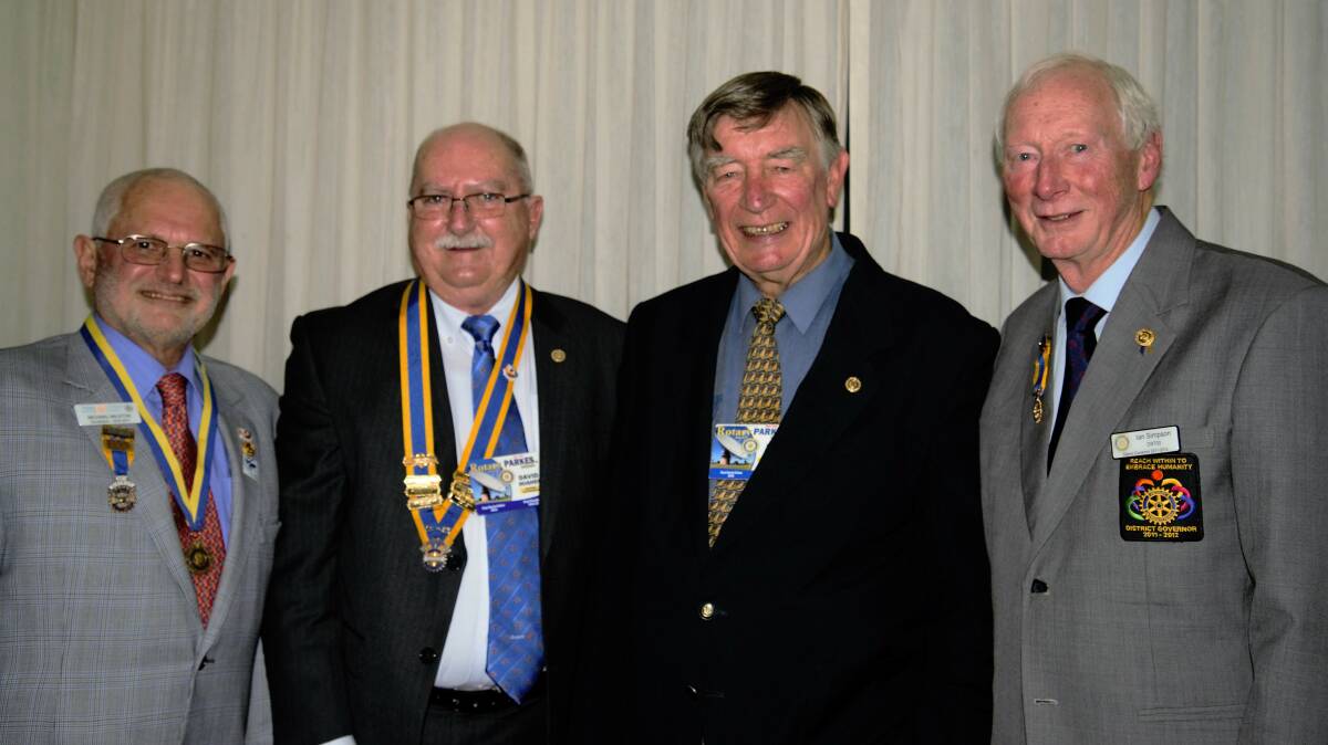 PARKES ROTARY: Rotary district governor Michael Milston, Parkes Rotary president David Hughes, former Parkes Rotary president Rex Veal and former Rotary district governor Ian Simpson at the Parkes changeover dinner in July.
