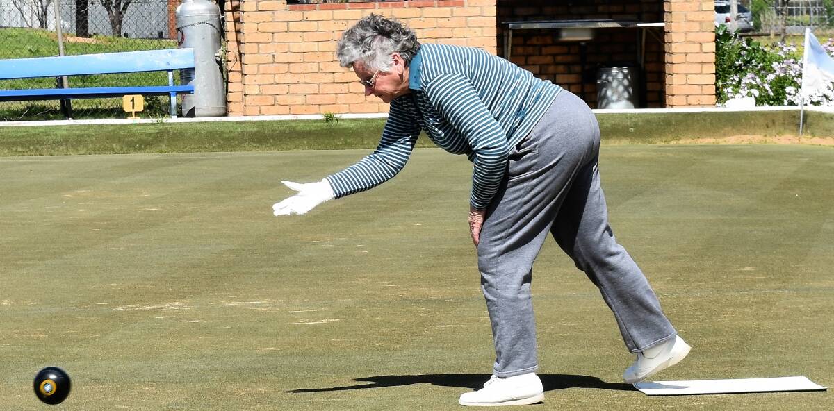 Rolling: President of the Parkes Railway Women's Bowling Club, Dawn Parker, managed to find a dry moment on the greens.