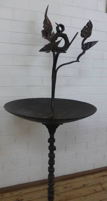 This beautiful bird bath is first prize in the raffle. 