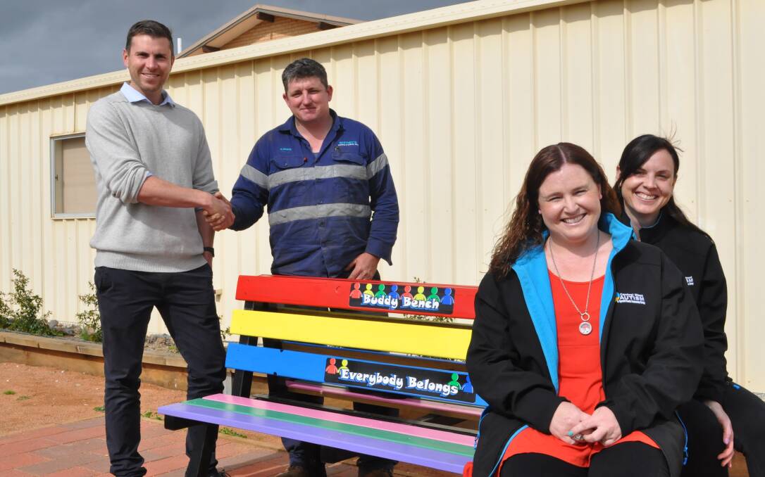 Pictured with the Buddy Bench in the Parkes Christian School Sensory Garden, from left - Glen Westcott (Parkes Christian School Deputy Principal), Anthony Whitney  (Whitney’s Welding and Bobcat Hire), Angela Wilson (Special Education Teacher) and Deb Collier, mum of an autistic child. 