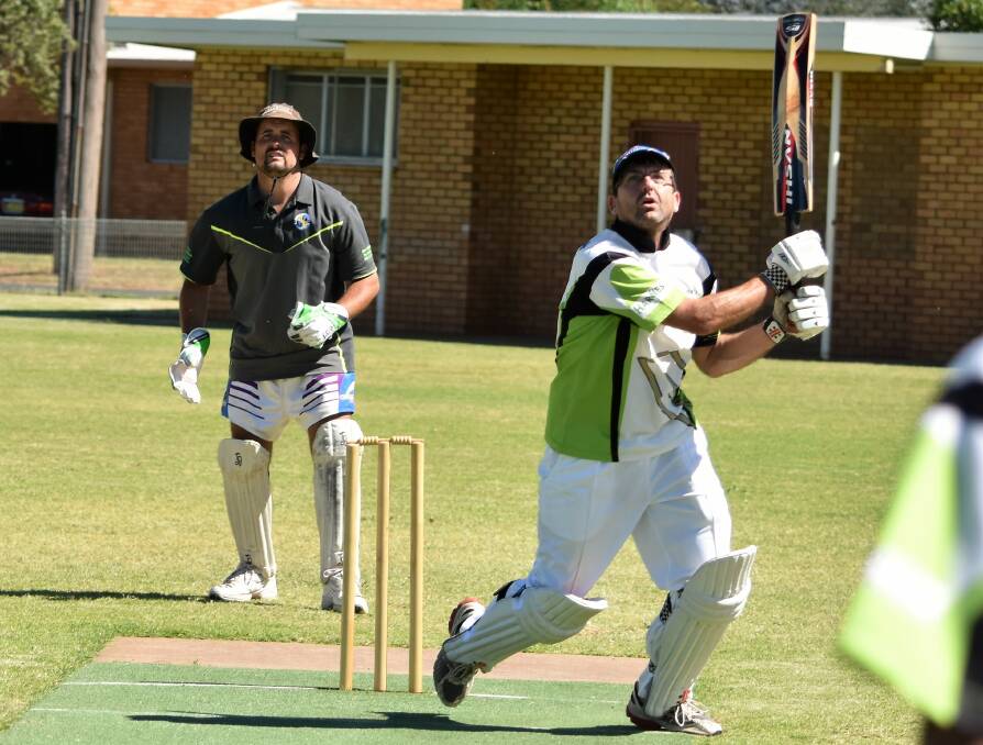 Star Hotel batsman Corey Rowbotham watches his shot in a match against the Parkes Bowling and Sports Club. Photos by Jenny Kingham. 