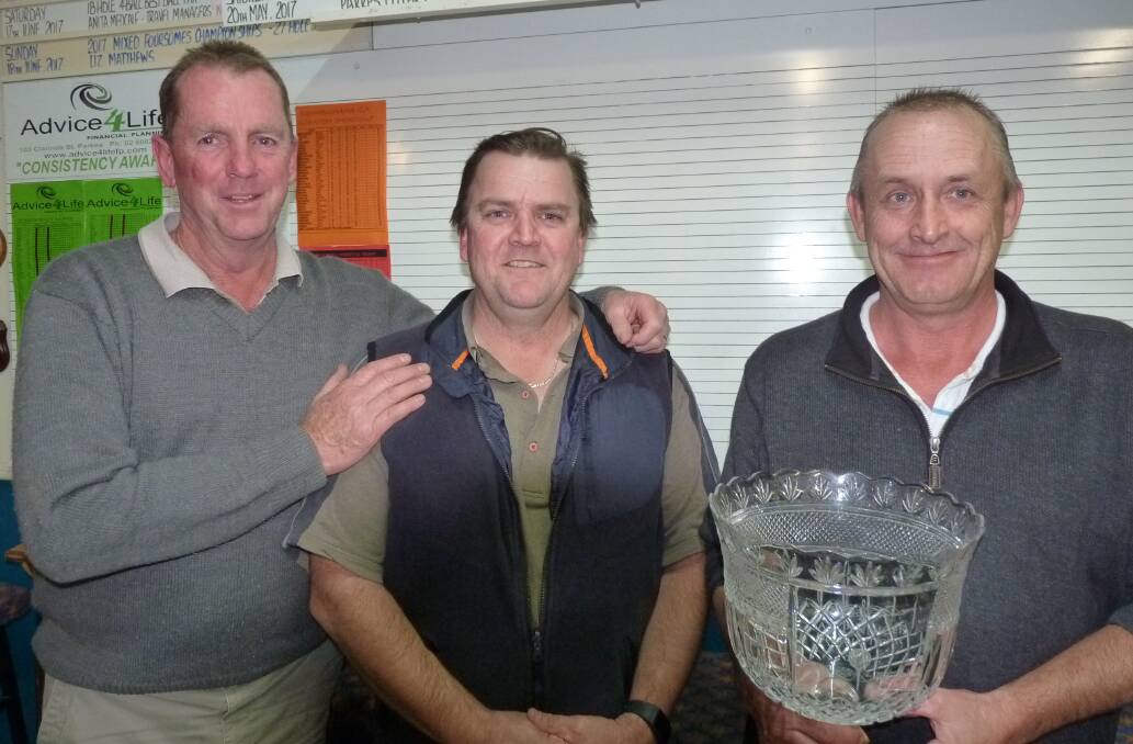 GREAT DAY OF GOLFING: Robert Cheney Individual winner, Grant Skinner from D'Aquino's and major winner Glen Buesnell were all smiles at the presentation of trophies at the Parkes Golf Club on Saturday.   