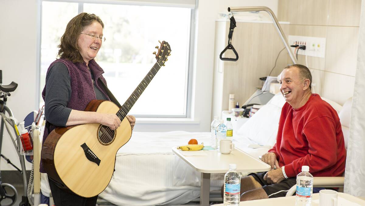 LAUGHS: Musician Kerrie Davies and Ross Beattie at Forbes Hospital. Photo Kim Storey.