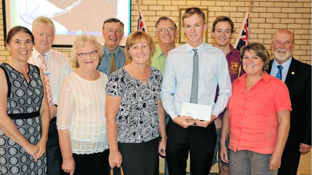 One of the 2016 Jack Scoble Educational Scholarship recipients, Luke Watt, is pictured with his family and members of the interviewing panel - from left, Mrs Shellie Buckle (Library Service Manager), Cr Michael Greenwood, Jan Wright (Luke’s grandmother), Rex Veal (Parkes Rotary Club president), Mrs Carolyn Watt (mother), Alan Wright (Pop), Luke’s brother Brad, Deputy Mayor Cr Barbara Newton, and Mayor Ken Keith. Photo: Bill Jayet