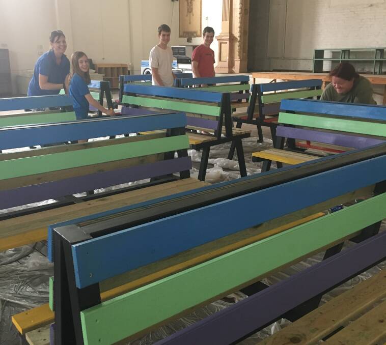 Buddy Bench painting production line.