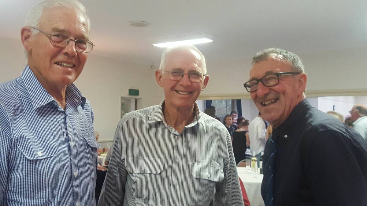 HAPPY BIRTHDAY: Father Brian (right) celebrated his birthday in style at the Trundle Golf Club with family and friends. He is pictured with good mates, Richard Clegg (left) and Alan McRae. 