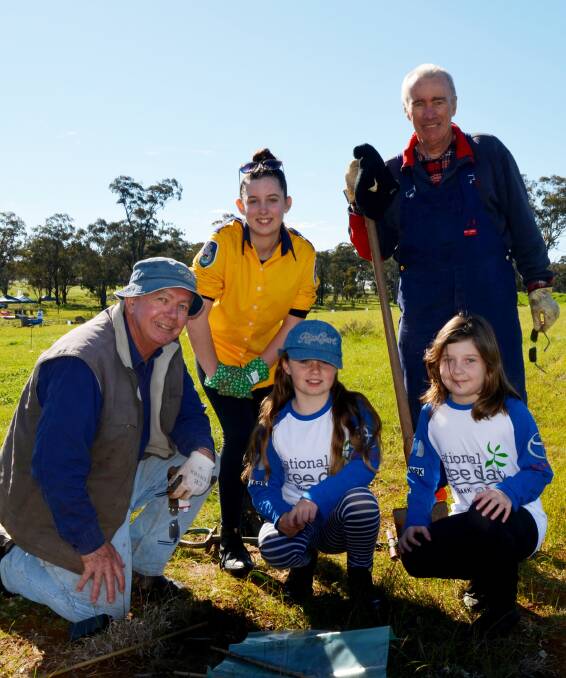 Councillor Bob Haddin, Steph Petersen, Ella Petersen, Shayley Anderson and Peter Guppy planted trees on Sunday for National Tree Day. Full story on page 15. 
