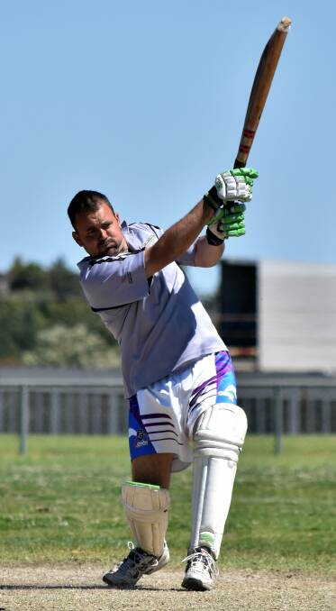 The Bowling Club's Brett Hutchings in action at Northparkes Oval. Photo by Jenny Kingham. 