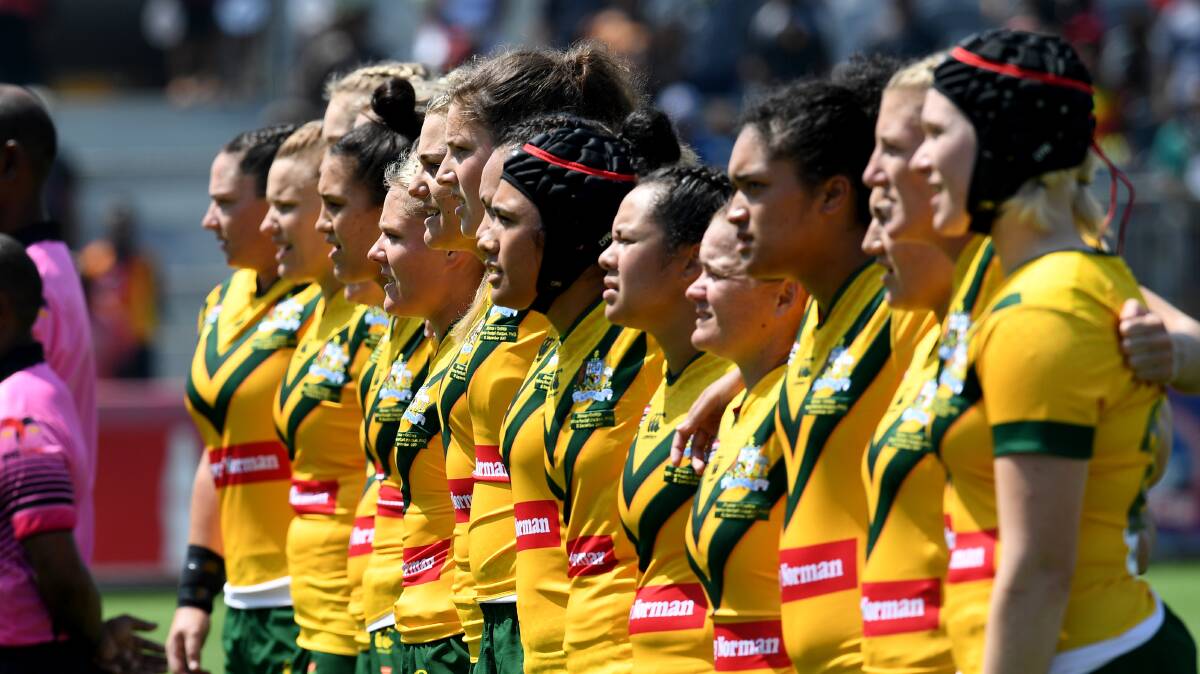 WORLD CUP BOUND: Vanessa Foliaki from Orange, pictured centre with head gear, has been named by Brad Donald in the Jillaroos squad. Photo: NRL Photos