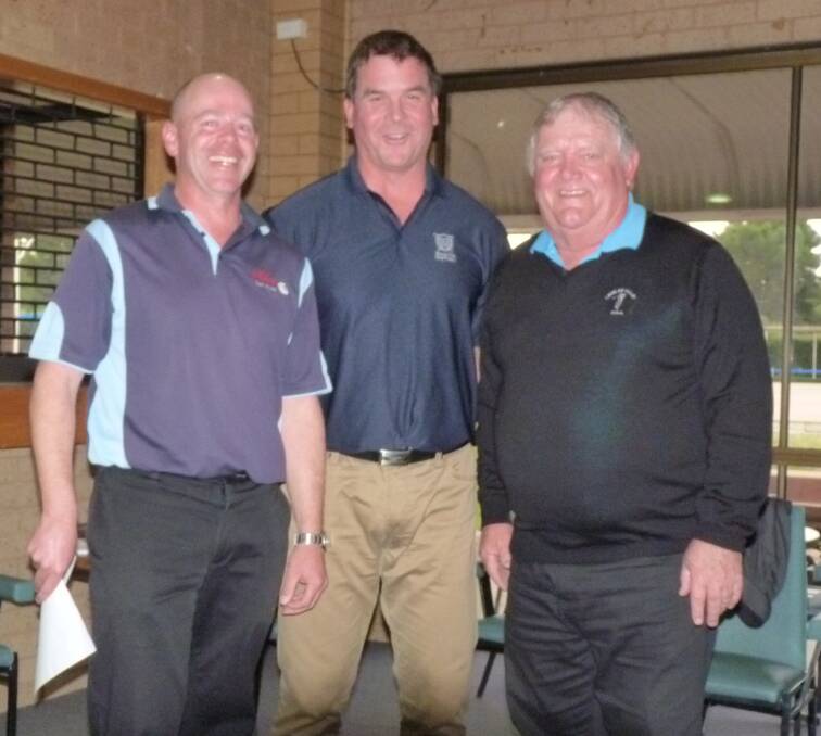 Barry Duncan and Paul Redman were congratulated on their Lachlan Valley Fourball Championship scratch victory by LVDGA president Paul Thomas.