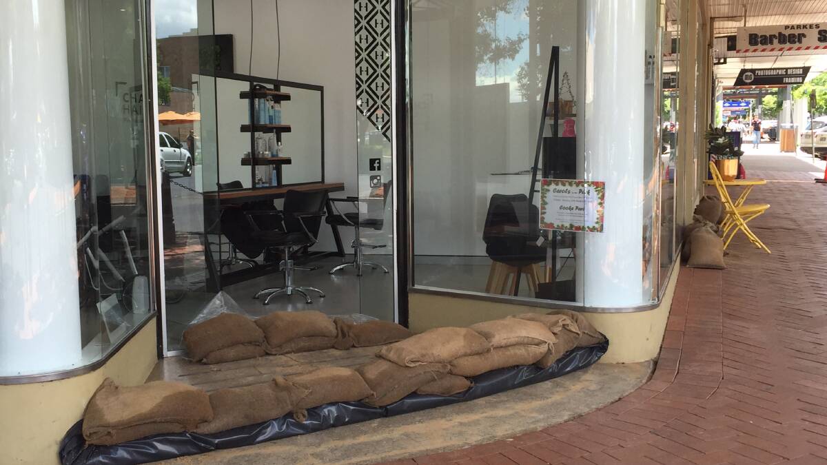 A number of Parkes businesses in Clarinda Street had to use sandbags to protect their premises when the main street flooded during the heavy downpours on Saturday.