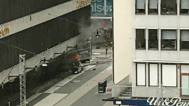 The scene shortly after a truck crashed into a department store in central Stockholm on Friday. Photo: AP