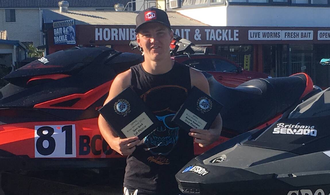 NEED FOR SPEED: Bailey Cunningham with his two Brass Monkey awards picked up for jet ski prowess early last year at Bells Beach in Clontarf. Photo: Supplied