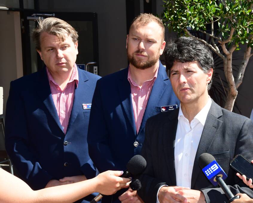 Finance Minister Victor Dominello, with Service NSW representatives Lachlan Meurer and Paul Sutton, says CTP reforms will save motorists an average of $70 a year.
