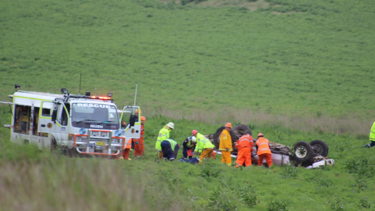 CRASH: Emergency services at the scene of Saturday's crash at Gilmandyke, south of Bathurst. Picture: TOP NOTCH VIDEO