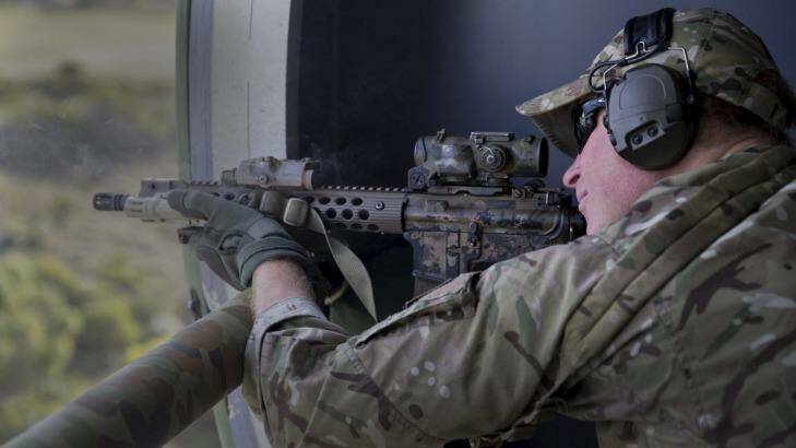 Captain Wales fires on a moving target range with Australian Special Air Service Regiment snipers as part of his Army secondment at Campbell Barracks Swanbourne, Perth.  Photo: Australian Defence Force