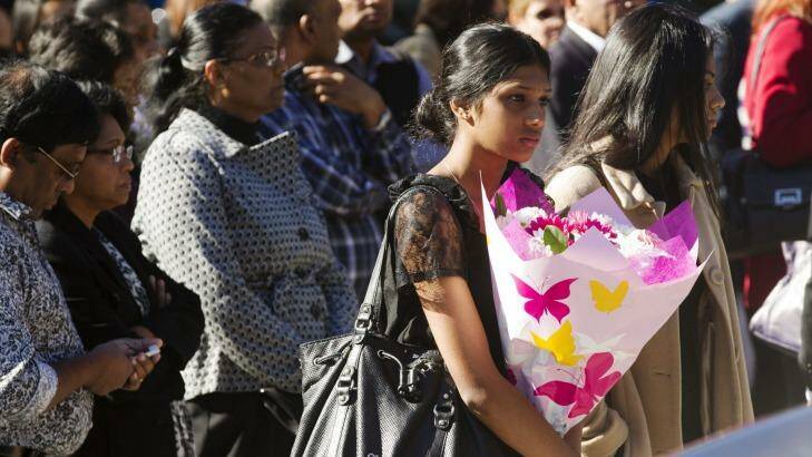 Mourners gather for the funeral of Myruan Sukumaran. Photo: James Brickwood