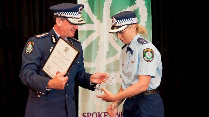 Detective Inspector Denby Lea Eardley collects an award from Commissioner Andrew Scipione in 2012. Photo: Supplied