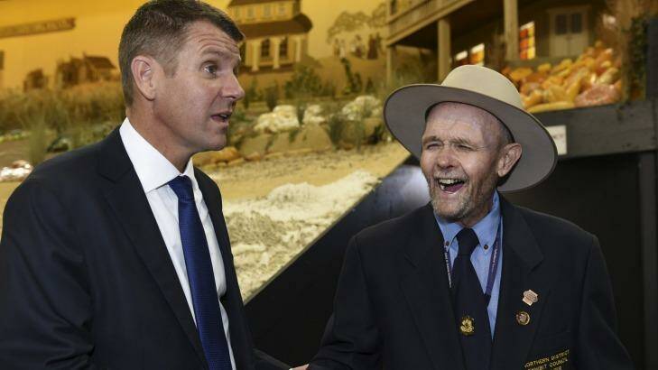 NSW Premier Mike Baird on the campaign trail in Homebush, where he meets Arthur Johns in the produce pavilion at the Royal Easter Show at the Sydney Showground.  Photo: Brendan Esposito