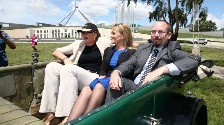 Labor Senator Kate Lundy, Liberal MP Fiona Scott and Senator Ricky Muir launch the Parliamentary Friends of Motoring in December 2014. Photo: Alex Ellinghausen