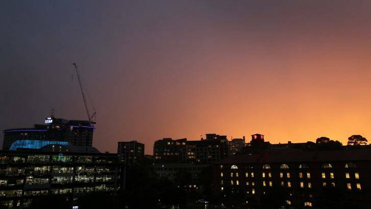 The sky picks up the last rays of sun as the storm front passes Pyrmont at 7pm. Photo: David Porter