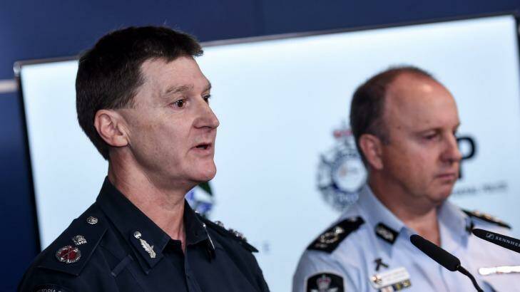 Victoria Police Deputy Commissioner Shane Patton (left) and AFP Assistant Commissioner Neil Gaughan speak about the five men who were apprehended in Cairns.  Photo: Jason McManus