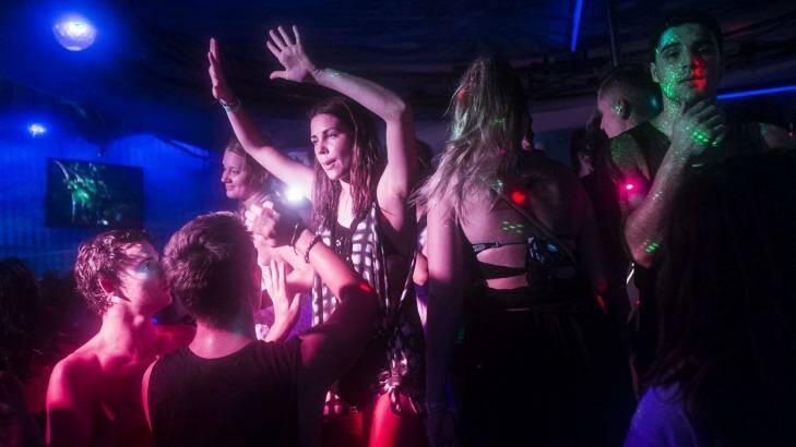 Schoolies hit the dancefloor in a Legian club. Photo: Nic Walker