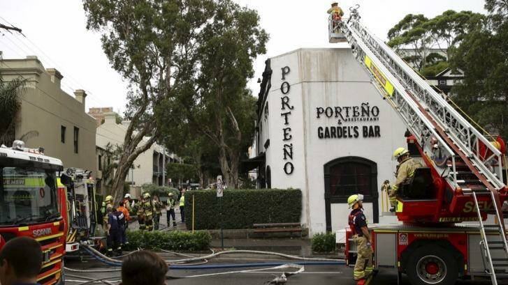 Firefighters extinguishing the blaze at Porteno, 2015. Photo: Wolter Peeters