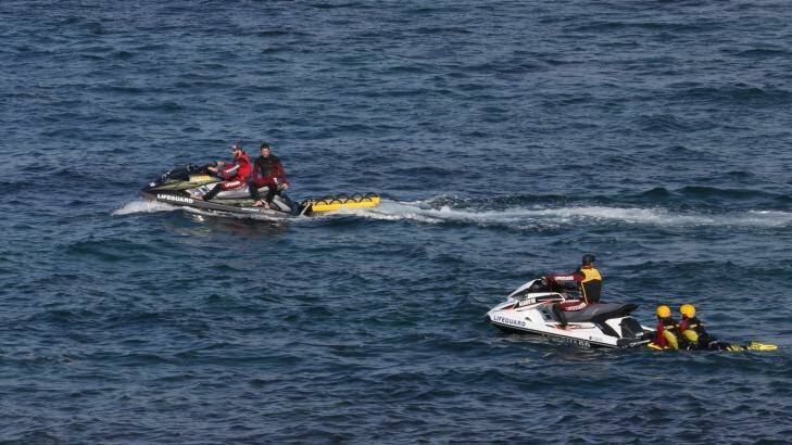 Jetskis search waters at Botany for Mr Nguyen. Photo: Louise Kennerley