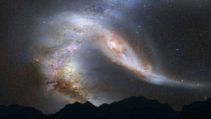 An impression of what a night sky could look like during the collision of the Milky Way and Andromeda galaxies. By that time, the sun will have swallowed the Earth. Photo: NASA