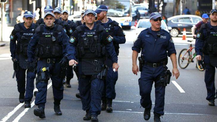 Police on the streets of Parramatta on Friday.  Photo: Wolter Peeters