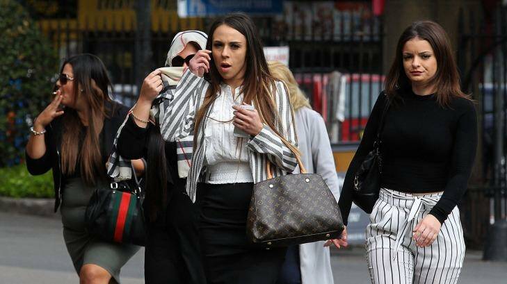 Lexy May Jamieson (centre) arrives with supporters at court on Tuesday Photo: Ben Rushton