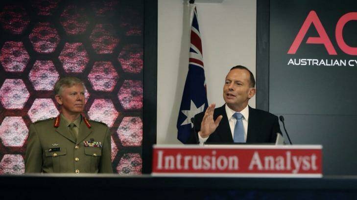 Prime Minister Tony Abbott opened the Australian Cyber Security Centre with General Stephen Day, in Canberra, on  November 27, 2014. Photo: Andrew Meares