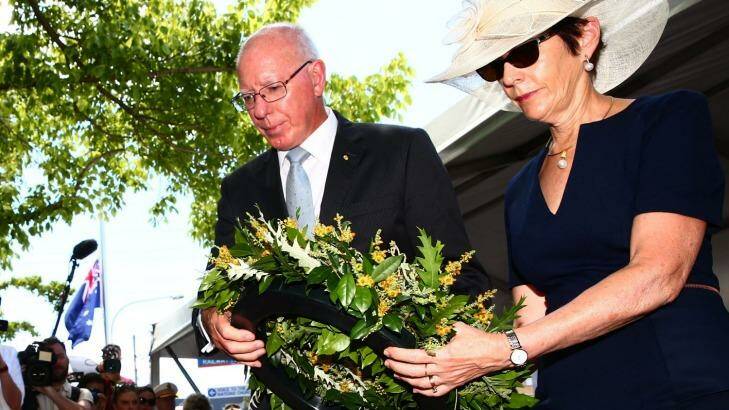 Governor David Hurley and his wife lay a wreath at the Granville ceremony. Photo: Geoff Jones