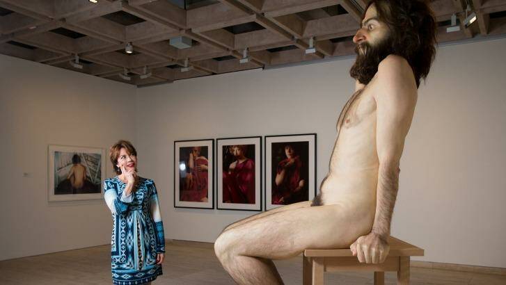 Author Kathy Lette with Ron Mueck's sculpture <i>Wild Man</i> at the Art Gallery of NSW. Photo: Janie Barrett