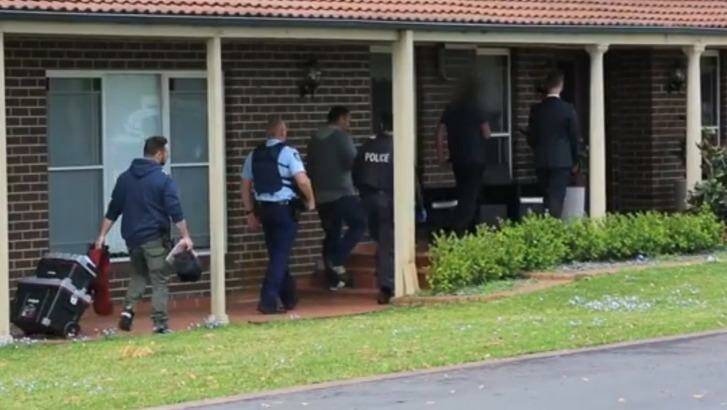 Police at Kristen Moukhallaletti's Theresa Park property. Photo: NSW Police