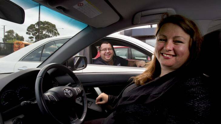 Danny and Jo lease 32 cars out to people who are driving for Uber. They say there is a ''never-ending'' demand from people who want to lease a car for up to six months. Photo: Simon O'Dwyer
