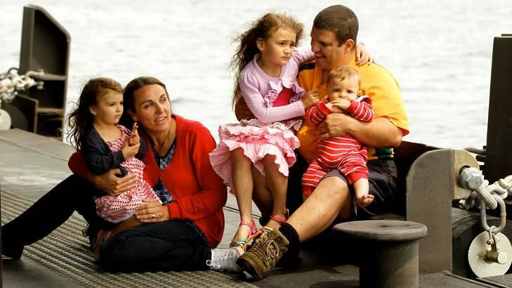 Close call: Glen and Kylie Borg with their children (from left)Bronte, Hannah and Alexander. Photo: Steven Siewert