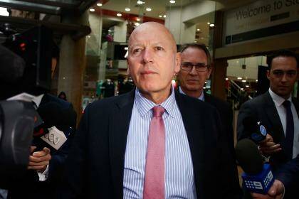 On his way: Chris Hartcher leaves the ICAC after giving evidence in September. Mr Hatcher made his farewell speech to the NSW Parliament on Thursday.  Photo: Daniel Munoz