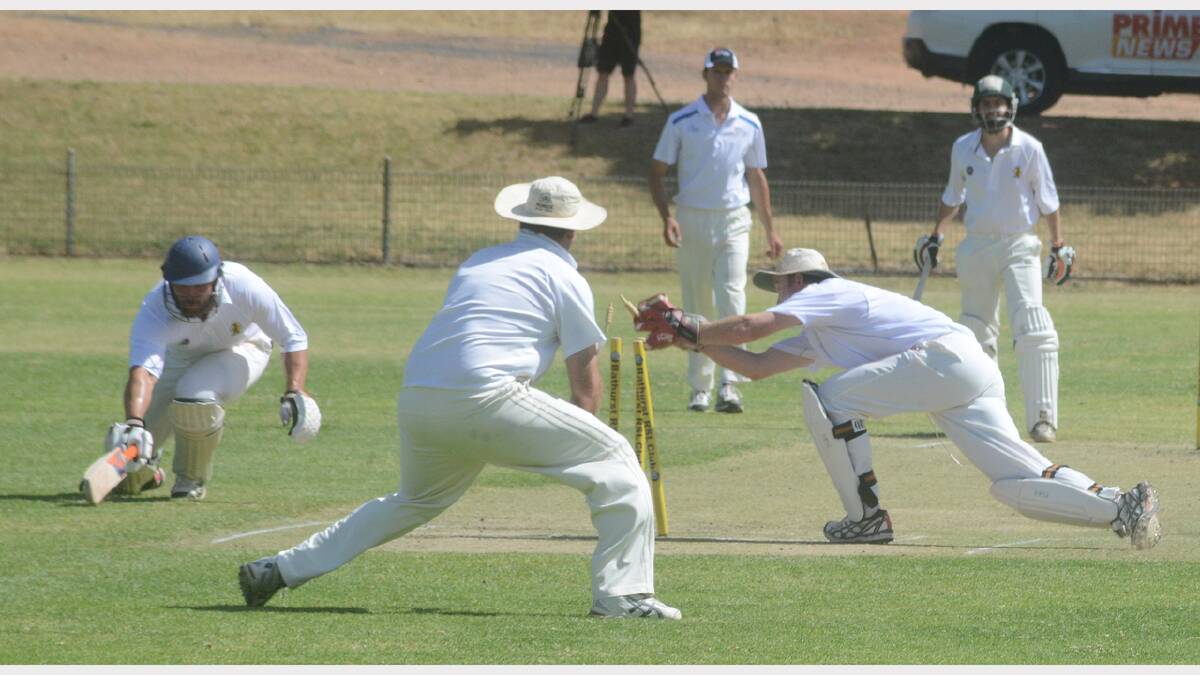 Peter Yelland was too quick for a diving Harry Schoemark to see the Bathurst batsmen short of his ground at a very hot Woodward Oval yesterday. 1114scgcricket_3456