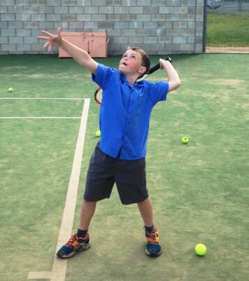 Jay Arrow practices some serving at Parkes Tennis Centre. sub