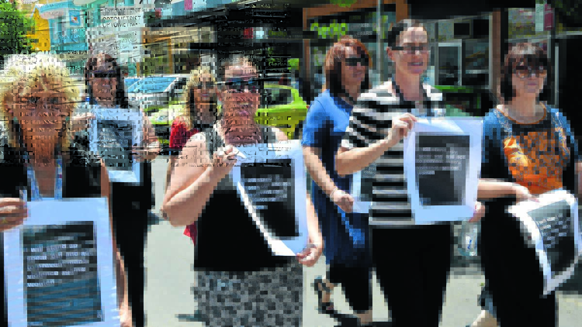 Locals supporting the White Ribbon Day march.