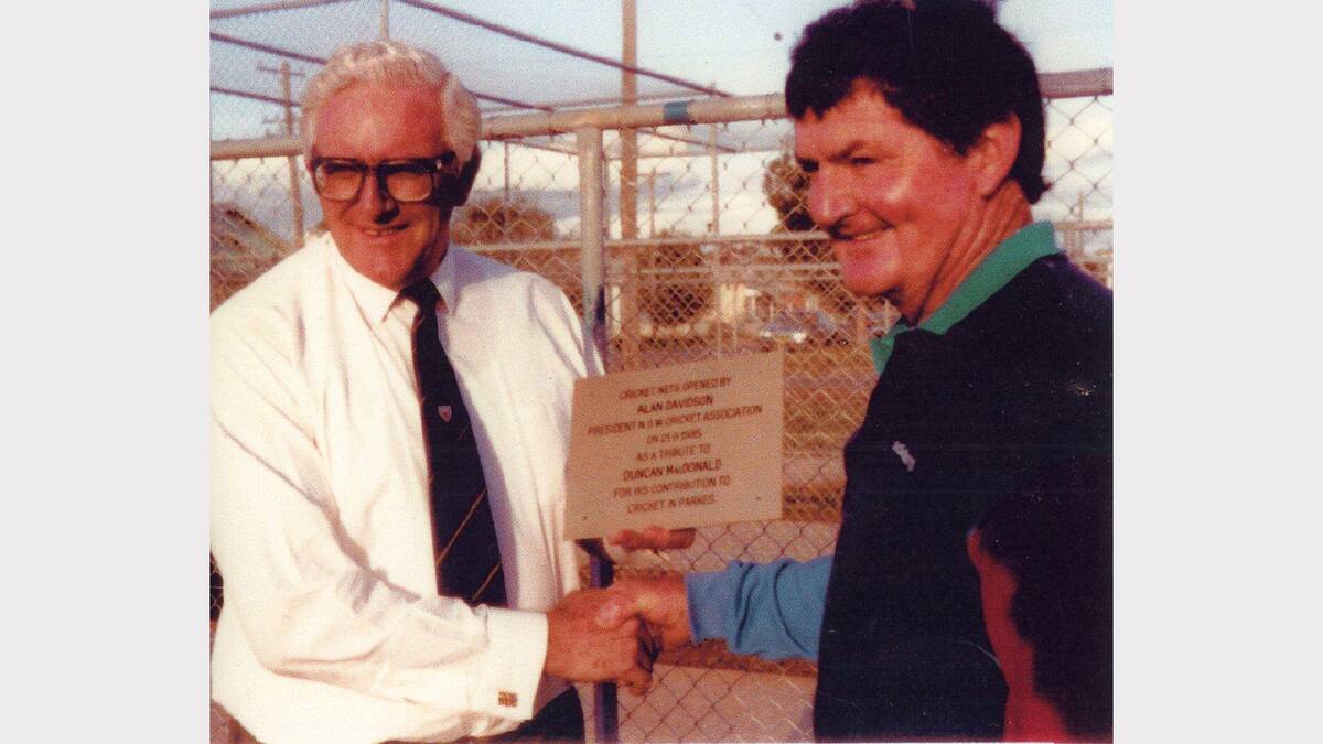 Alan Davison presenting the plaque for the opening of the original Duncan MacDonald nets.