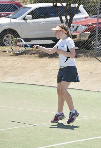 Laura Kirk was completely focused on this shot at Parkes Tennis Centre. sub