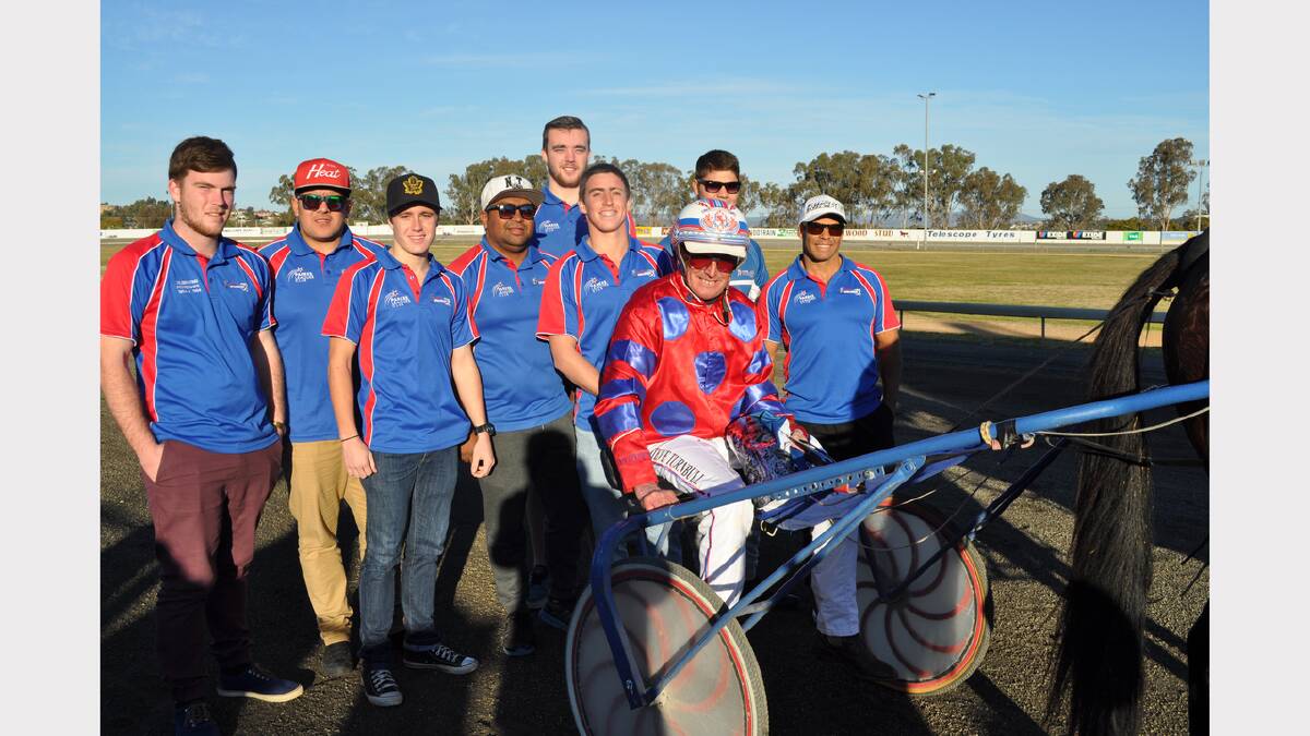 The Parkes Harness Racing Club hosted a number of the Parkes Spacemen Rugby League Football Club players at it race meeting last Sunday afternoon. It was fitting that the Red and Blue colours worn by Steve Turnbull were successful as this is the stripe of the Parkes Spacemen and Parkes community including the harness racing club. Steve drove his usual good race, parking off the speed and bring his pacer, Written In Style home with a well timed run. Pictured with Steve Turnbull after the event are from left - Sam Coburn, Aubrey Milson, Joe Dwyer, Michael Mitchell, Brad Davis, Sam Dwyer, Jordan Pope and captain-coach Dennis Moran. sub
