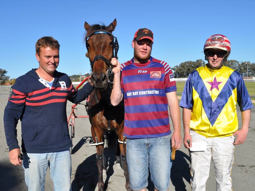 Jason Gaffney (trainer), Warwick Edgerton (owner) and Murray Sullivan were all smiles after their second win last Sunday with Home In Indiana in the Footy Colours Day Pace. The trio had won earlier in the day with Montana Maestro in the Good Luck Today Parkes Spacemen Pace. sub