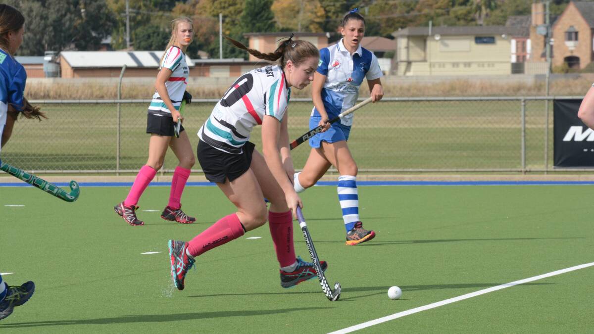 HARD TO STOP: Kelly Baker and Bathurst City will be overwhelming favourites to see off Confederates in today’s Premier League Hockey match in Orange. Photo: PHILL MURRAY 	041616pcity4
