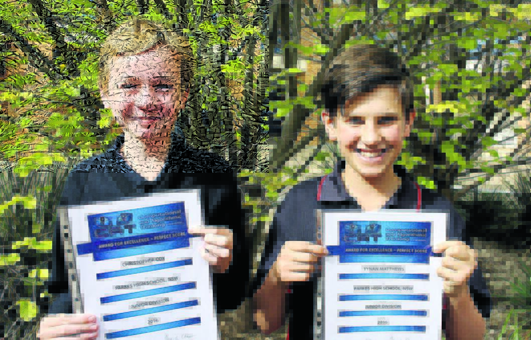 TOP TWO PER CENT IN AUSTRALIA: Year 8 students, Chritopher Cox and Tynan Matthews proudly display their perfect score certificates for the Categorical and Algorithmic Thinking competition. 